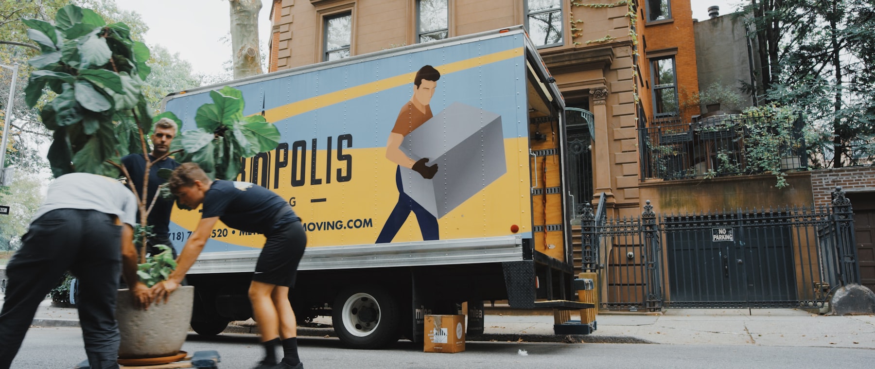 Up N Go moving truck at a Brooklyn brownstone
